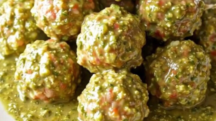 A high-angle view of succulent turkey meatballs simmering in a rich