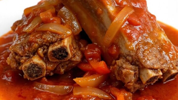 A top-down view of tender boneless country-style pork ribs in a slow cooker