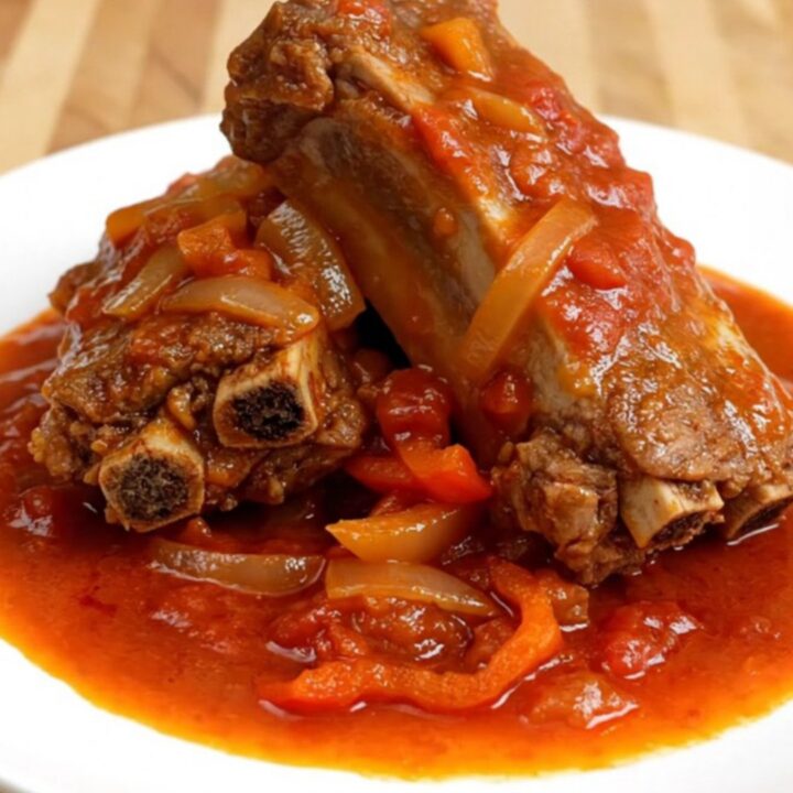 A top-down view of tender boneless country-style pork ribs in a slow cooker