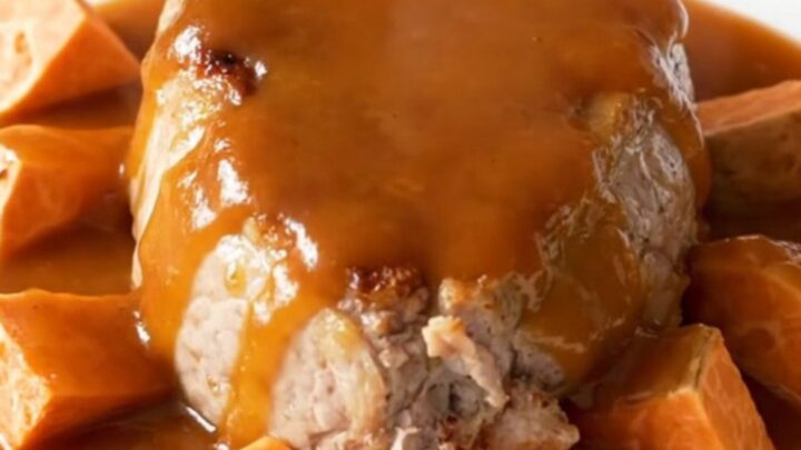 A top-down view of slow cooker maple sriracha pork tenderloin with sweet potatoes.