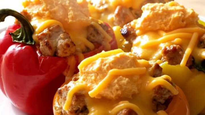 Close-up of crockpot cream cheese chicken stuffed peppers in a slow cooker.