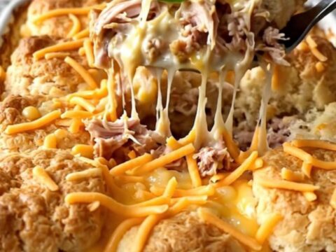 A top-down view of a creamy jalapeno popper turkey bake in a rectangular ceramic dish