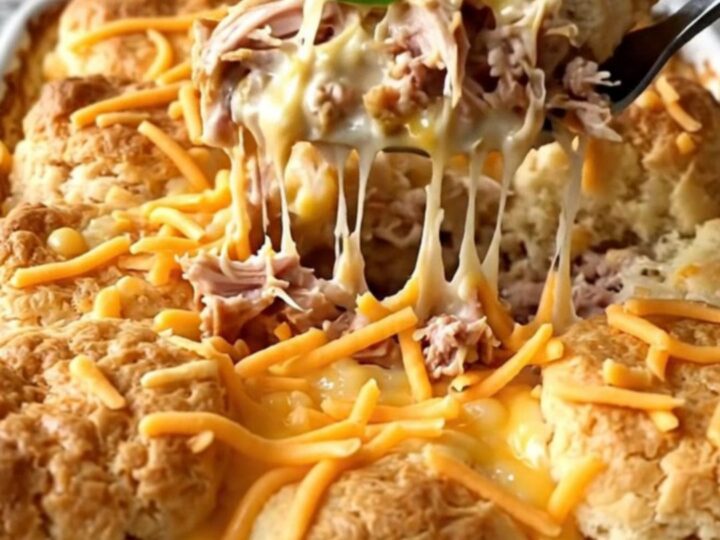 A top-down view of a creamy jalapeno popper turkey bake in a rectangular ceramic dish