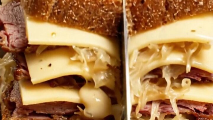 A sky-high pastrami Reuben melt on toasted marble rye with oozing melted Swiss cheese and Russian dressing.