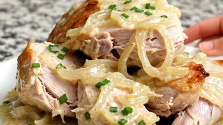 Slow cooker sour cream and onion turkey tenderloin with a thick creamy sauce and fresh chives.