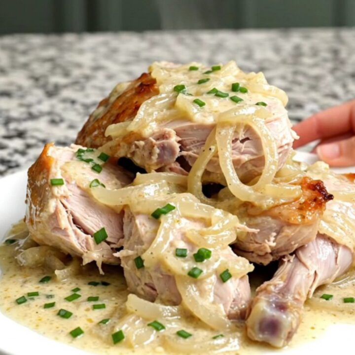 Slow cooker sour cream and onion turkey tenderloin with a thick creamy sauce and fresh chives.