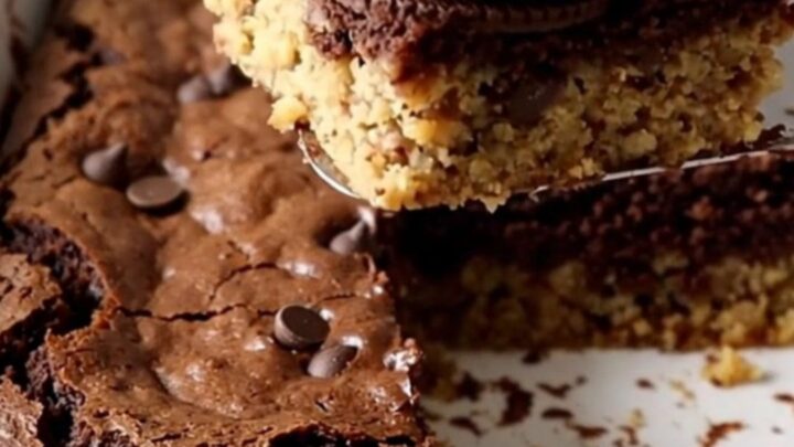 Triple layer cookie brownie bars showing distinct layers of cookie dough, sandwich cookies, and fudgy brownie.