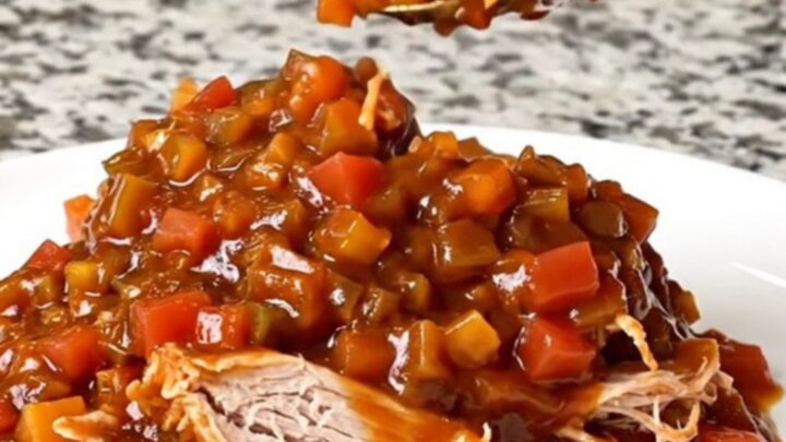 A close-up of a heaping spoonful of root beer turkey sloppy joe filling