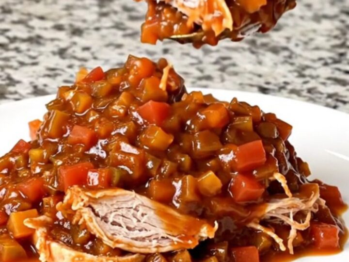 A close-up of a heaping spoonful of root beer turkey sloppy joe filling