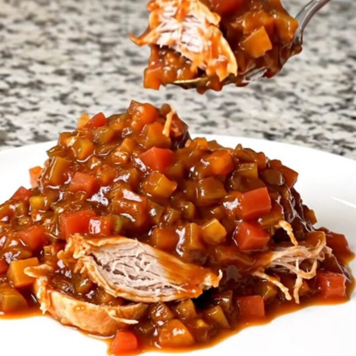 A close-up of a heaping spoonful of root beer turkey sloppy joe filling