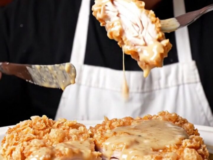 A crispy saltine-crusted chicken fried steak covered in creamy cracked-pepper gravy.