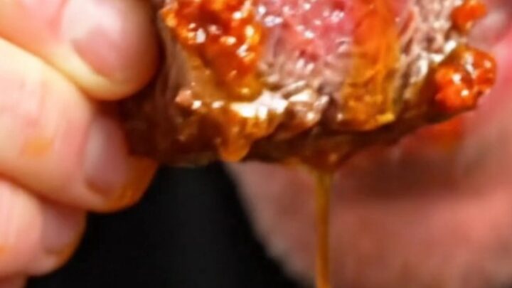 Juicy picanha steak bites with a crispy golden fat cap glistening with red chorizo butter.