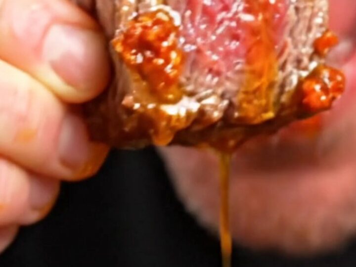 Juicy picanha steak bites with a crispy golden fat cap glistening with red chorizo butter.