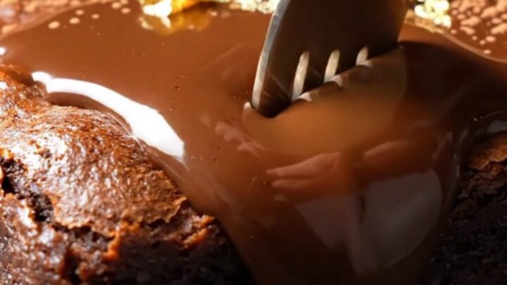 A warm, decadent espresso Kahlua brownie with a glossy dark chocolate ganache topping.