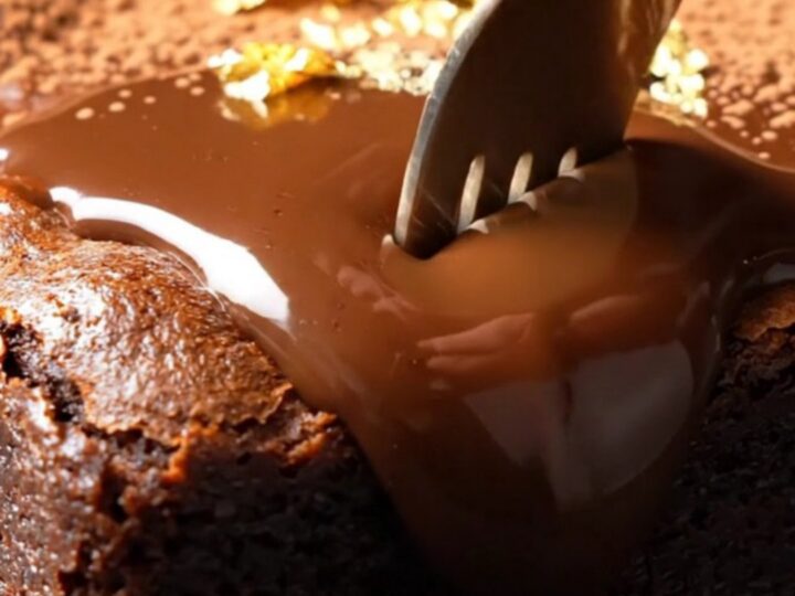 A warm, decadent espresso Kahlua brownie with a glossy dark chocolate ganache topping.