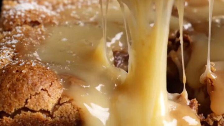 A golden, soft white chocolate blondie with a rich, glossy horchata glaze dripping down the sides.