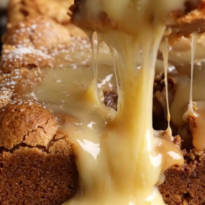 A golden, soft white chocolate blondie with a rich, glossy horchata glaze dripping down the sides.