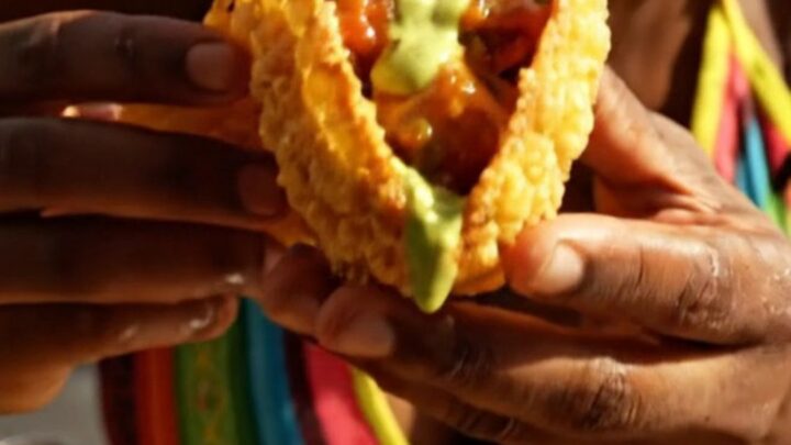 Crispy golden plantain cups filled with jerk chicken and topped with mango salsa.
