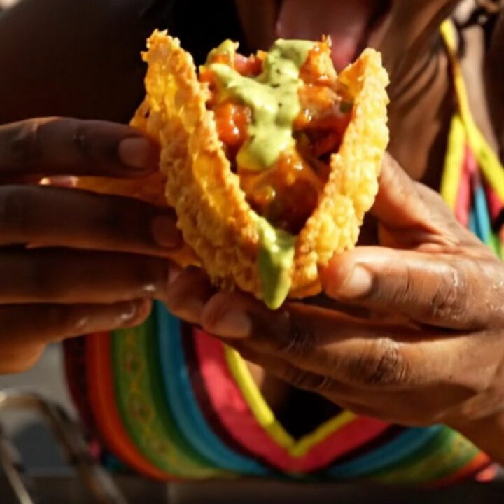 Crispy golden plantain cups filled with jerk chicken and topped with mango salsa.