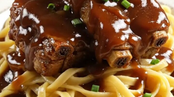 Succulent country-style pork ribs glistening with a thick, dark root beer and molasses glaze