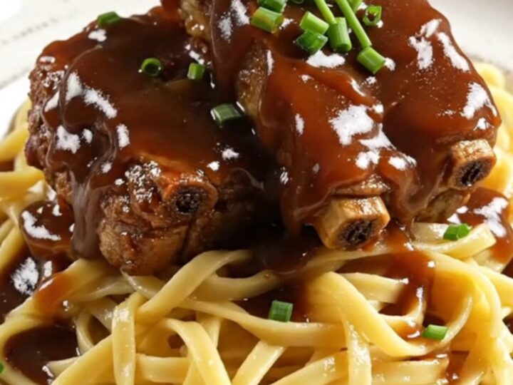 Succulent country-style pork ribs glistening with a thick, dark root beer and molasses glaze
